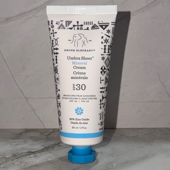 Drunk Elephant Skincare Trio with White, Pink, Yellow, Blue Accents - Picture 5 of 5